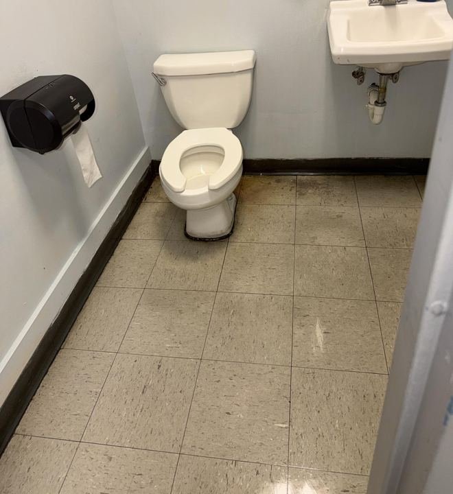 Office restroom cleaned — commercial cleaning